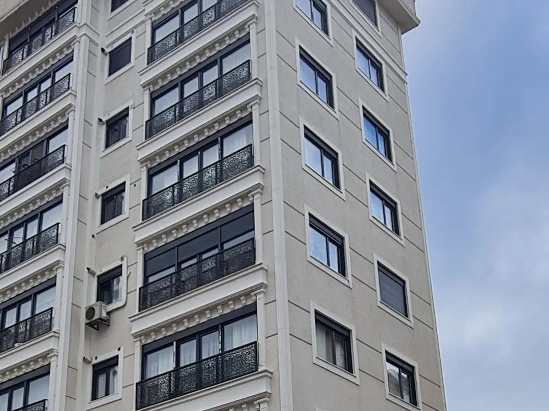 Yıldız Apartments cornice profiles and ornamental balcony railings